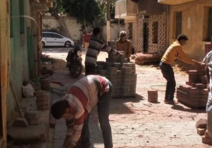 رفع كفاءة الشوارع بمنطقة الحرس الوطني ببنها